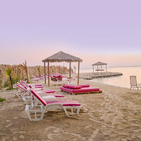Lagoona Beach Luxury Resort And Spa Manama Exterior photo Beach at the resort